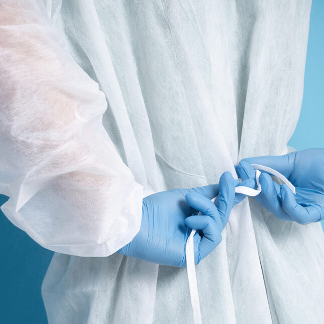 Disposable surgical gown made of pla nonwoven fabric